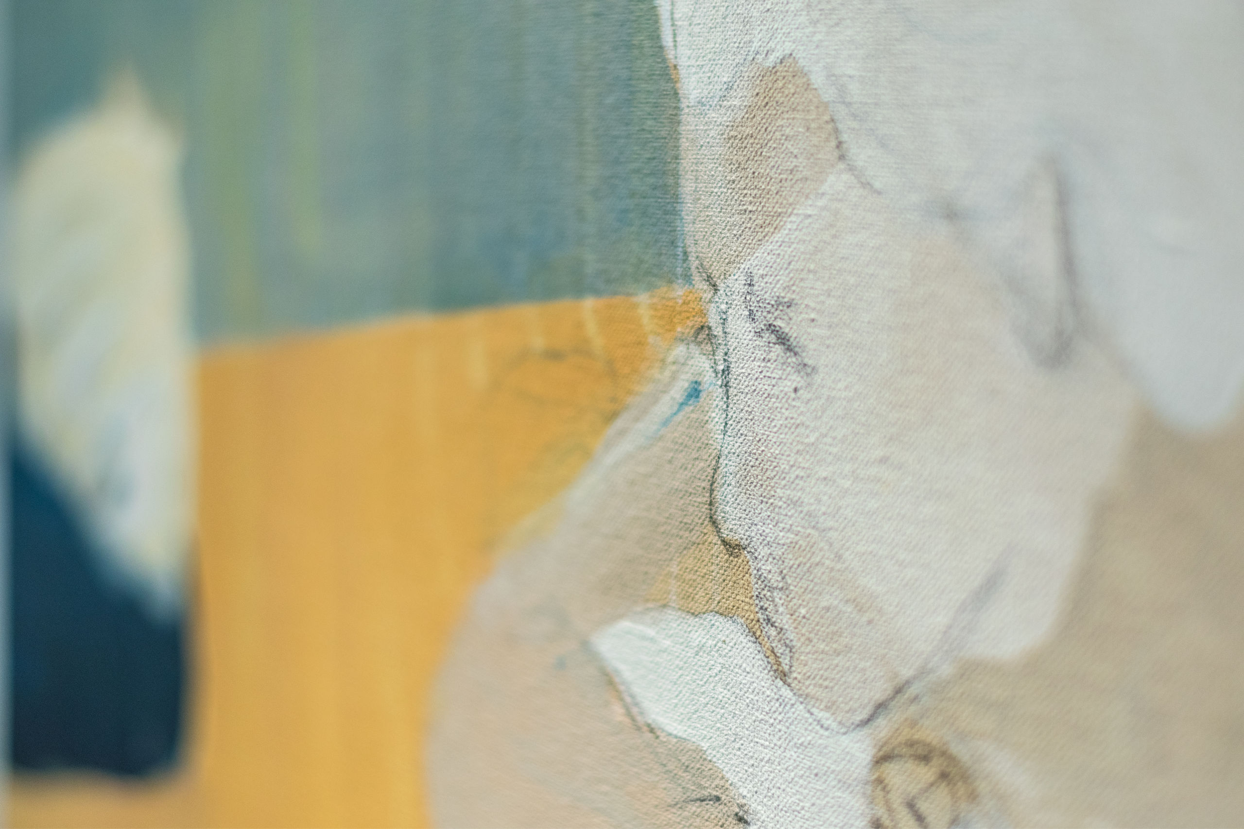 Close-up of painting showing tan, yellow and teal tones.