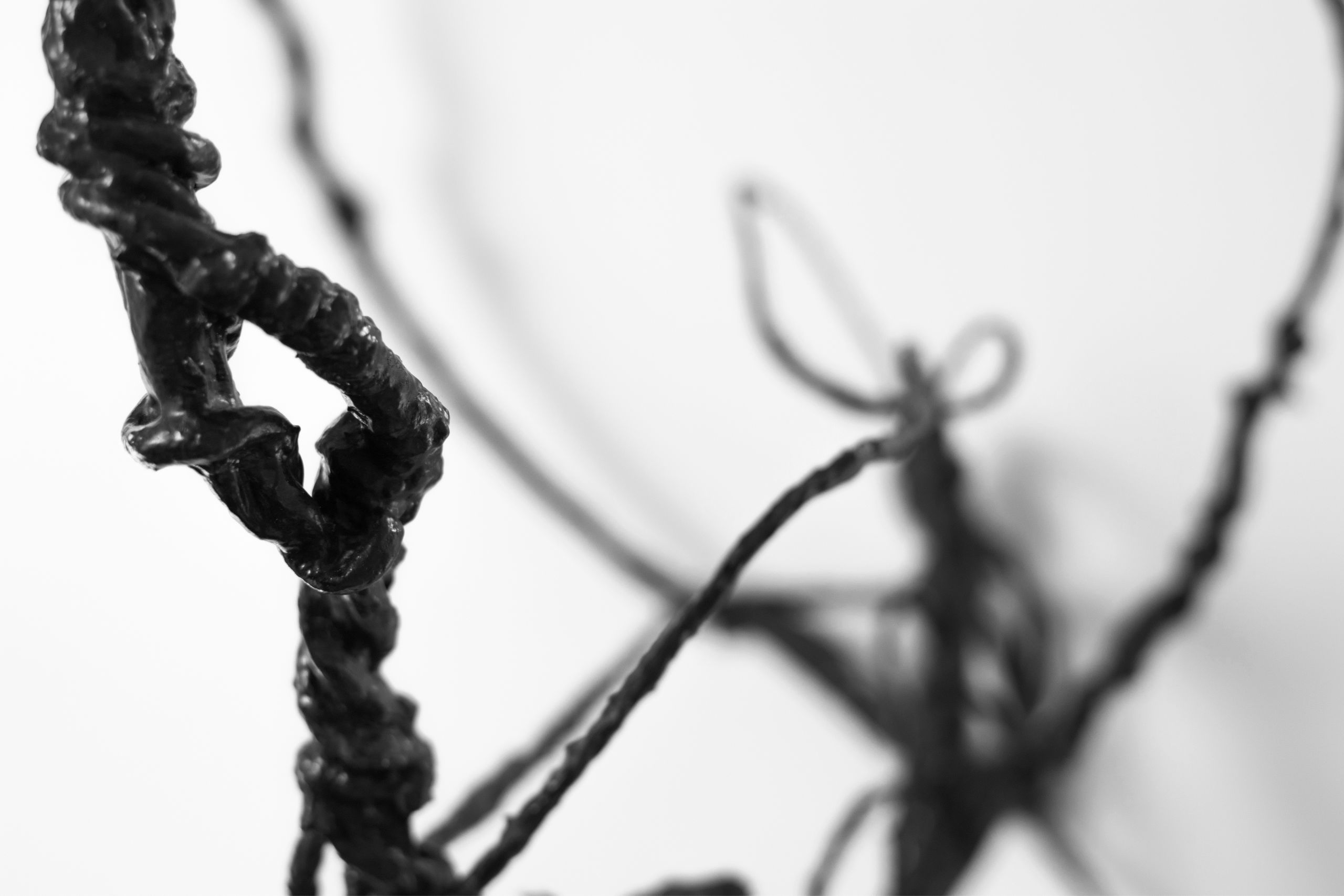 Close up of string artwork.